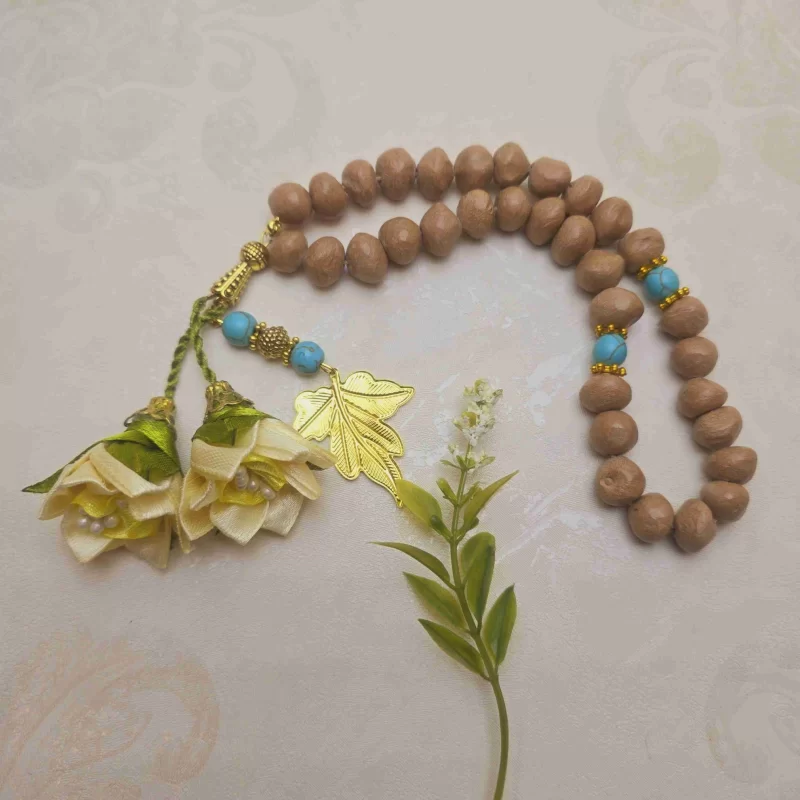 تسبیح تربت 33 دانه با گل نرگس