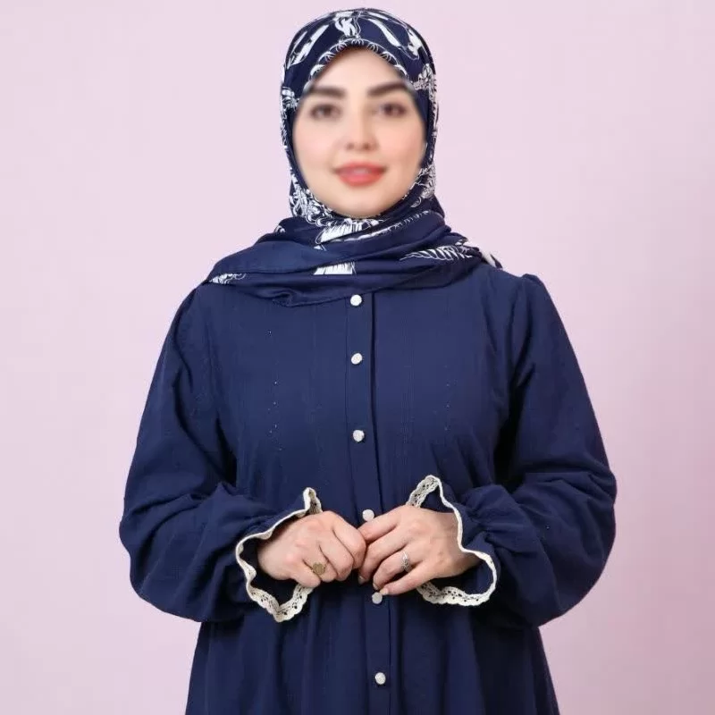 پیراهن زنانه سرمه ای طرح آراسته خامه دوزی شده