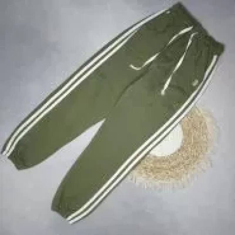 شلوار پسرانه اسلش طرح تیرا رنگ سبز
