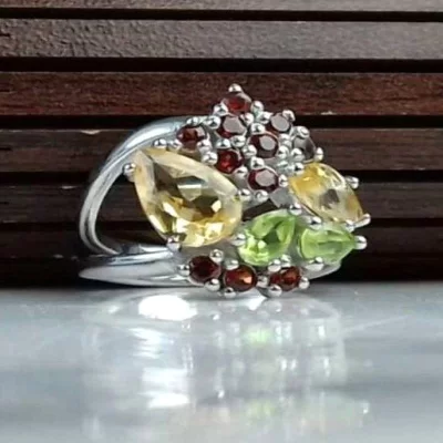 انگشتر زنانه جواهری سنگ اصلی سیترین، زبرجد و یاقوت سیلان